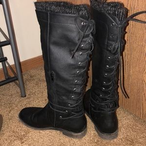 Tall black lace up in the back boots!